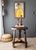 The scale and color of this original figurative painting are striking. A girl wearing a vibrant marigold flowing dress...