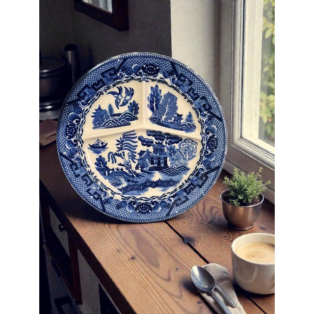 The Vintage Japanese Willow Divided Blue & White Plate is a collectible piece that showcases the traditional Japanese...