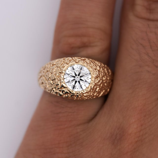 1.80 carat round brilliant cut lab grown diamond cvd mens ring. Set in 14 karat solid gold with a textured ring shank....