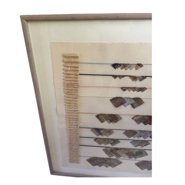 A commanding original mixed-media work of striking scale and quiet intensity. Rows of richly patinated paper fragments —...