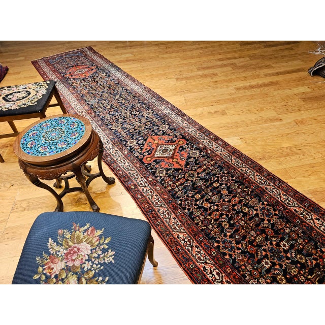 "A rare and highly desirable vintage Persian Malayer long runner, handwoven in the first quarter of the 1900s in the...