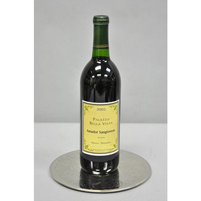 Vintage Mid Century Silver Plated 8" Round Leafy Scroll Design Pot Trivet. Circa Mid 20th Century. Measurements: 0.25" H x...