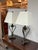Design Plus Gallery presents a Pair of Vintage French Country Table Lamps. This matching pair has scroll-form metal frames...