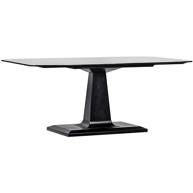 A minimal metal dining table that exudes balance and power.