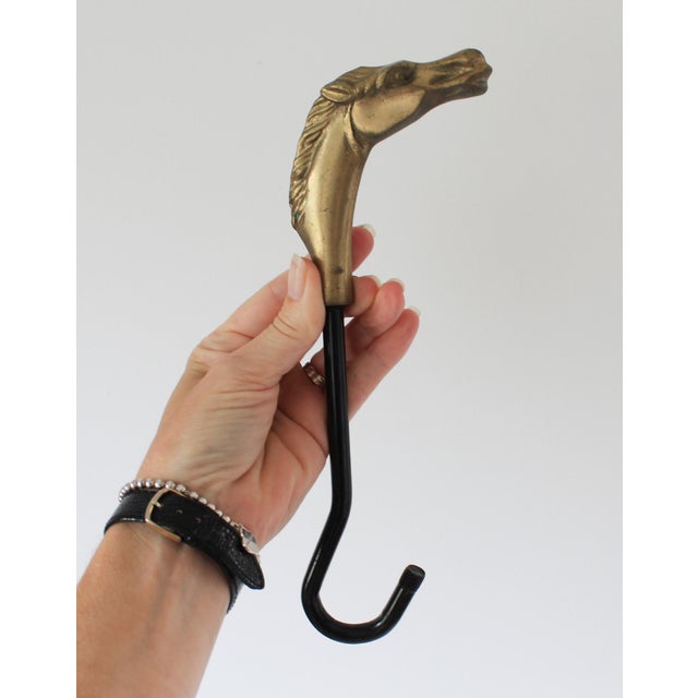 Vintage equestrian horse fireplace damper hook. No makers mark. Missing bottom brass piece. Patina.
