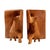 Hand-carved from solid sycamore, each bookend in this pair depicts a stylised elephant seated upright beside a thick...