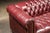 Late 20th Century Vintage Deep Red Leather Tufted Chesterfield Sofa With Brass Nailhead Trim For Sale - Image 5 of 9