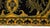 Indonesian cloth finely decorated with floreal motives in yellow and green on a dark blue background. The item is not...