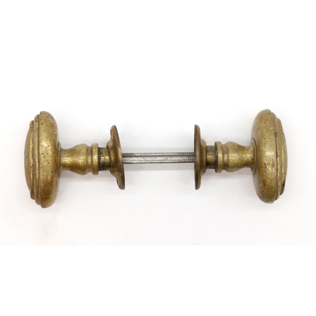 Vintage concentric oval bronze door knobs. The manufacturer and date of creation is unknown. Priced per pair of knobs with...