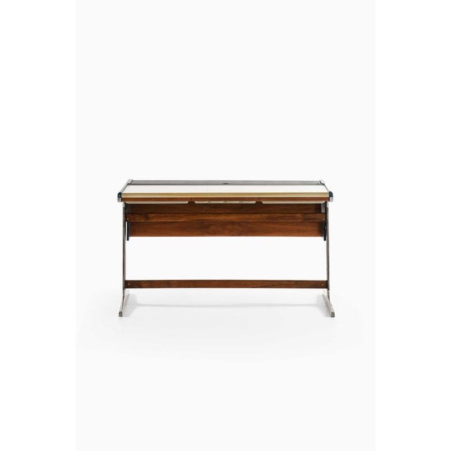 This rare freestanding desk, designed by george nelson and produced by herman miller in the united states, is a...