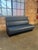 A sleek, high-back banquette bench attributed to Martin Brattrud, reupholstered in new leather in a deep steel blue/slate...