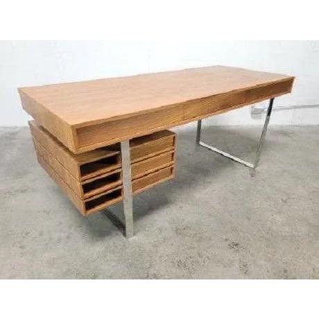 The Cliff Young Boxeo desk is a classis long standing modern classic at CY. With bright polished steel geometric legs and...