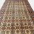 This antique Turkish rug from the Cappadocia region, approximately 90 years old, showcases a beautifully structured...