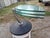 Tempered glass, chrome, and leather coffee table, "Ligne Roset," circa 1970s/80s. Height: 46 cm, Diameter: 110 cm (petals...