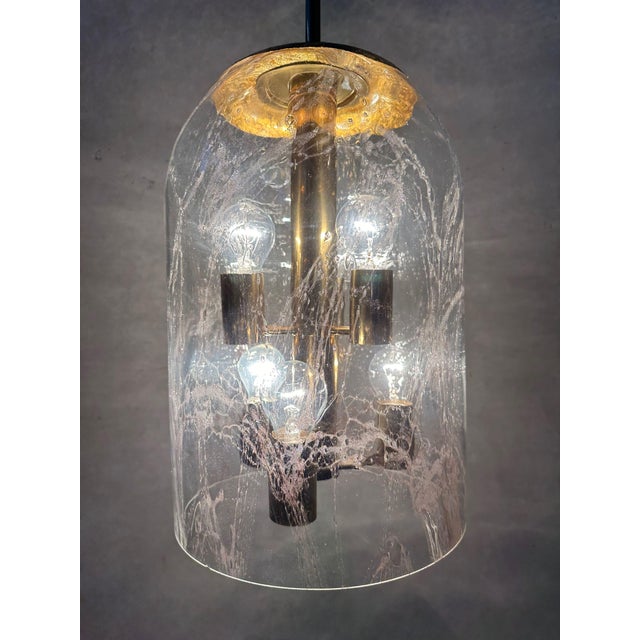 Large vintage pendant lamp by doria leuchten. Brass sputnik fixture surrounded by a large, hand-blown crystal dome. A...