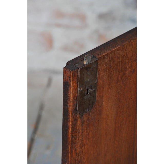 This architecturally refined vertiko cabinet in the Biedermeier spirit dates from the 1830s in Bohemia. The primary visual...