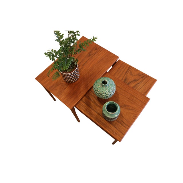 Danish set table in a very elegant model made with great care. The set consists of three different tables in three...