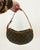 Louis Vuitton Monogram Pochette Croissant in excellent condition. Signature monogram canvas exterior in brown and tan LV...