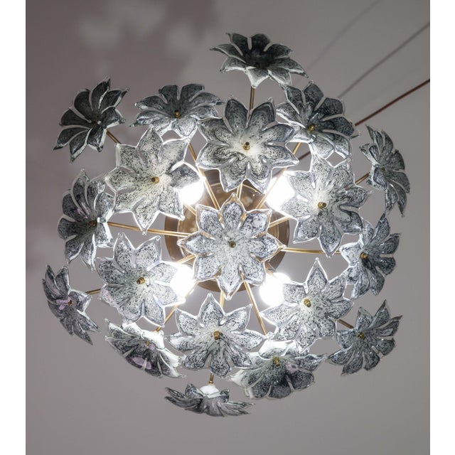 Vintage Murano glass chandelier full of black flowers. The chandelier has 4 light points with E14 connection, possible to...