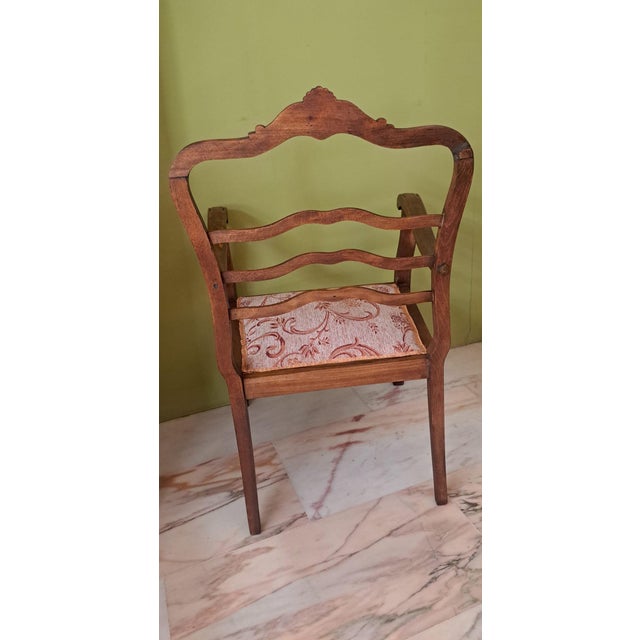 A beautiful French provincial armchair or chair in the Louis XV style, dating from the 1930s. Made of carved walnut, it...