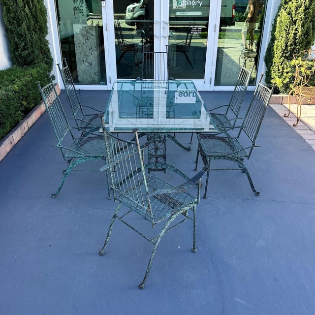 John Salterini 'El Prado' Collection wrought iron dining table with a vintage applied verdigris finish. Finish is in good...
