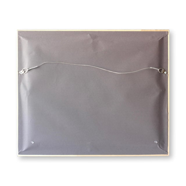 Midcentury French landscape painting showcasing a serene vineyard set against rolling hills and a historic stone church....