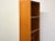 A mid century modern two piece teak bookcase. Made in Denmark. 34.75” wide. 16.5” deep. 71” tall.