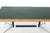Herman Miller Eames Segmented Table Desk or Dining Table. The tabletop is covered in synthetic leather. It shows some...
