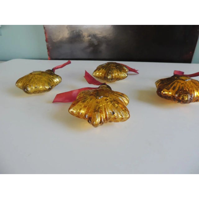 Set of Four (4) Gold Tone Mercury Glass Ornaments with Silk Ribbons Size: 4"W x 5"H x 2"D Very heavy/thick glass.