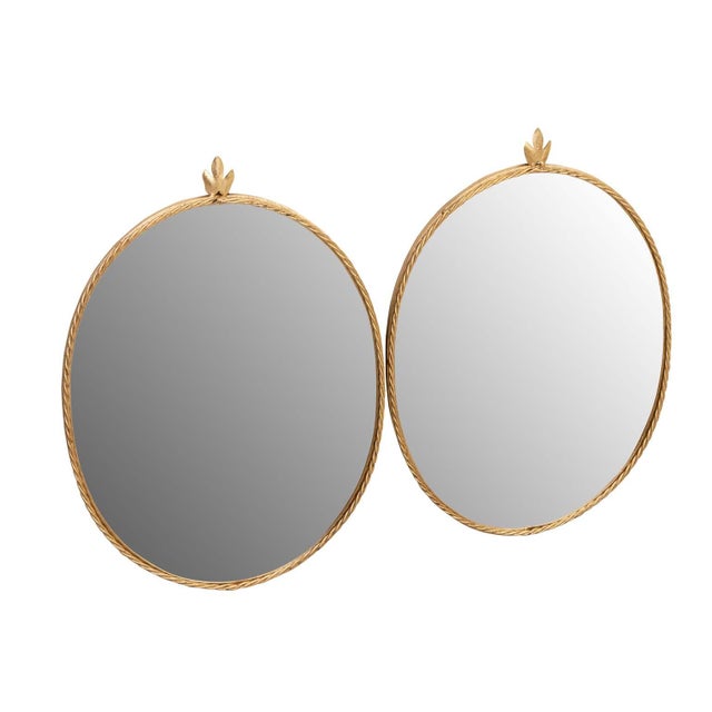 Pair of Italian Hollywood Regency Gilt Iron Rope Mirrors. In good overall condition with newly replaced mirror in each....