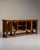 Carved walnut gothic-arch buffet in Rich Walnut Brown. Its rich walnut brown finish sets off four arched-panel doors,...
