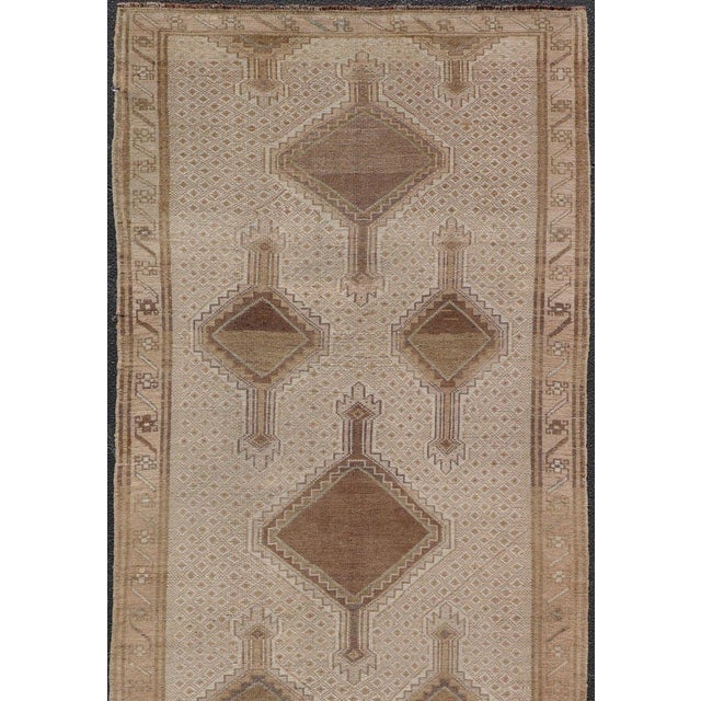 Measures: 5'0 x 13'3 Vintage Turkish Kars Gallery Runner in Warm Taupe, Sand, and Soft Brown. Keivan Woven Arts /...