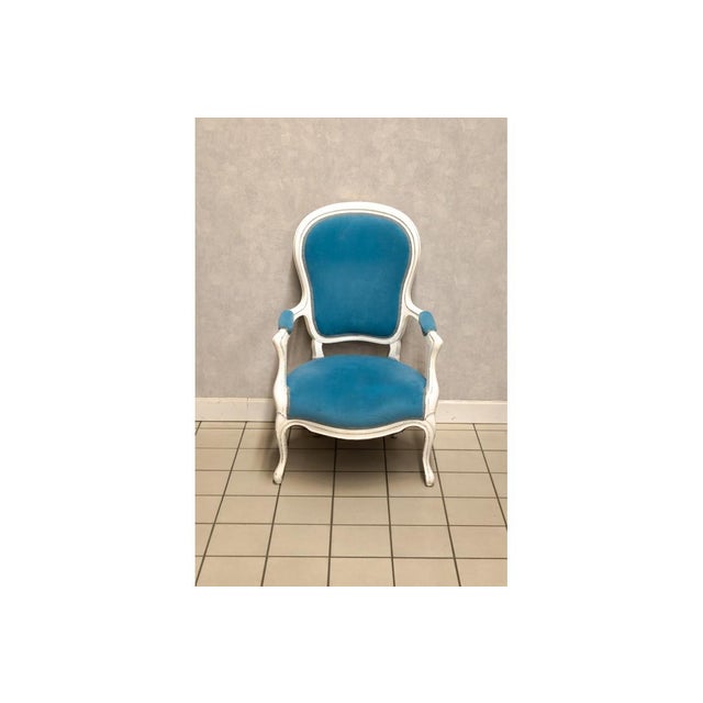 Cozy armchair, France, circa 1920. Very good condition. Wood: walnut Dimensions: height 99 cm, seat height 38 cm, width 64...