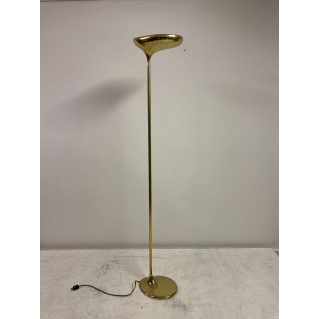 A sculptural brass floor lamp By Giovanni Santoni for C.S. Arte, dating to the late 20th century. The design is defined by...