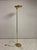 A sculptural brass floor lamp By Giovanni Santoni for C.S. Arte, dating to the late 20th century. The design is defined by...