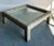 This exceptionally stylish coffee table is a bold expression of Postmodern and 1980s design, utilizing dramatic texture...