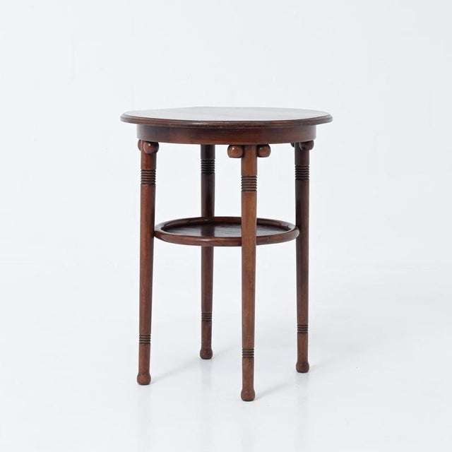 This delicate side table was made by Josef Hoffmann around 1905. Manufactured unknown. The table is made from birch wood...