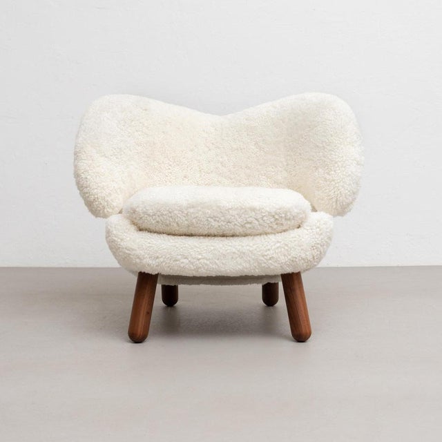 Pelican chair designed by Finn Juhl in 1940, relaunched in 2001. Manufactured by House of Finn Juhl in Denmark. Pelican...