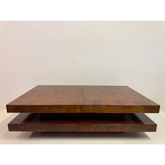 Lacquered Goatskin Sliding Coffee Table, Italy, 1970s A striking coffee table, produced in Italy during the 1970s,...