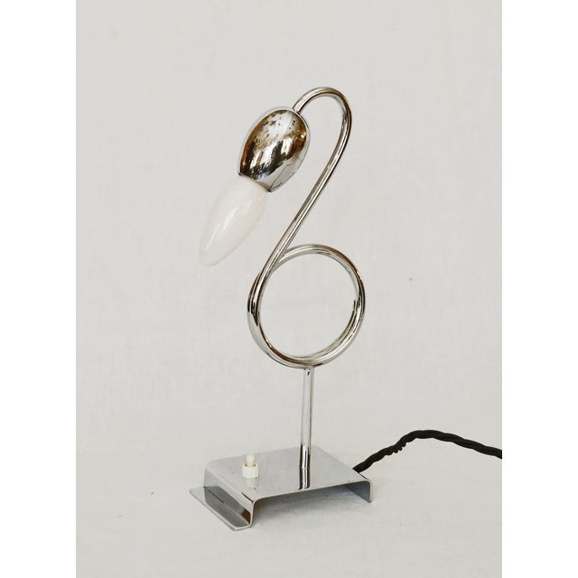 Art Deco Floor Lamp Exceptional Art Deco table lamp made around 1925. Nickel-plated brass. Spiral-bent tube. The lamp has...