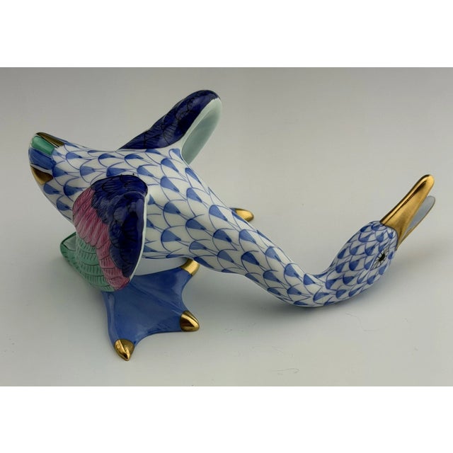 Beautiful and highly collectible, this MINT condition Herend Squawking Goose figurine showcases the exquisite...