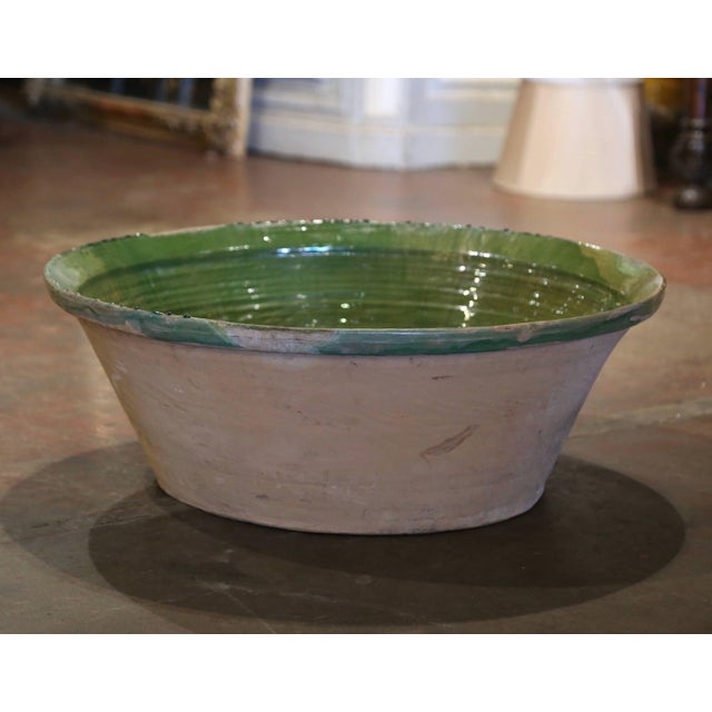 This large antique "Tian" (Provencal term for serving bowl), was crafted in Provence, southern France circa 1880. Round in...