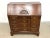 Antique Chippendale-style mahogany secretary desk featuring a distinctive block-front design, slant-front writing surface,...
