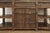 The Atlantic Collection by Crafters and Weavers features multi-wood panels and hand wrought decorative hardware to create...