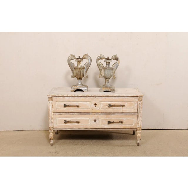 A Pair of Italian carved-wood urns, with single candlestick, in bird motif, from the 19th century. These antique single-...