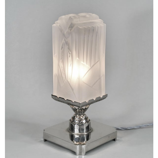 Léon Hugue A wonderful French 1930 art deco table lamp by the Paris based company of Léon Hugue, A nickel plated solid...