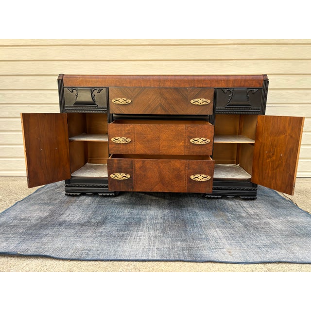 Brown Vintage Art Deco Waterfall Sideboard or Buffet Featuring Burl Wood Veneers, Black-Painted Accents, and Ornate Brass Hardware For Sale - Image 8 of 12