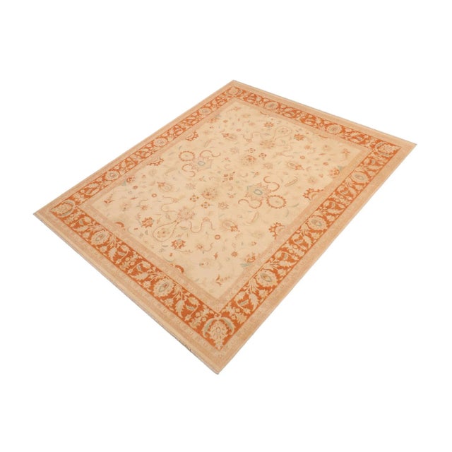 "Enhance the ambiance of your home with this magnificent Persian-influenced Turkish hand-knotted rug made by skilled...