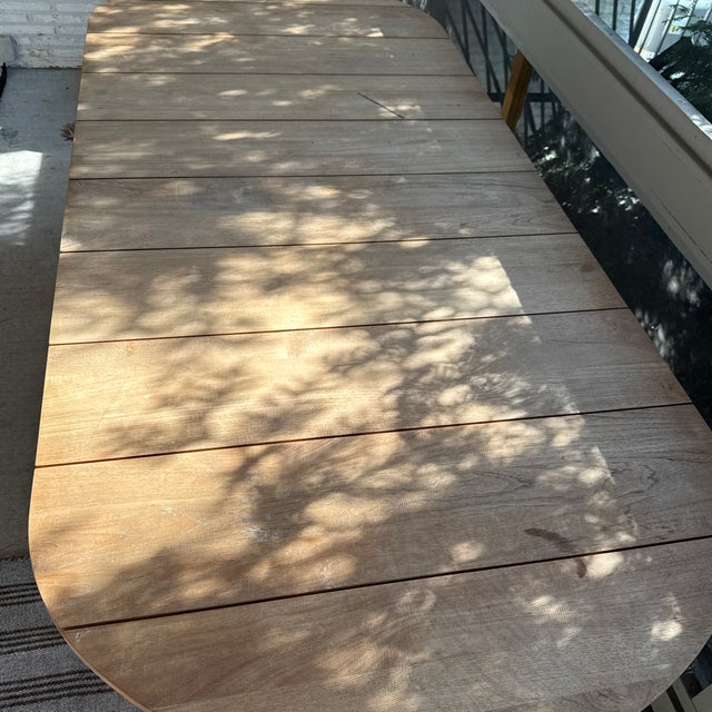 Designed with high-quality teak wood, this is an all-weather dining piece built to be both durable and beautiful. The...