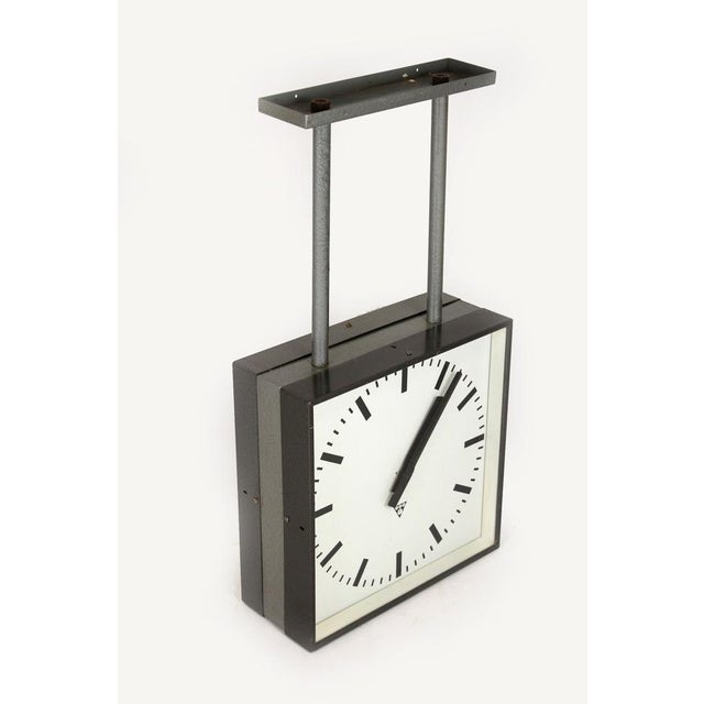 Large double sided railway clock made by Pragotron in former Czechoslovakia in the 1980s. The clock has been converted...